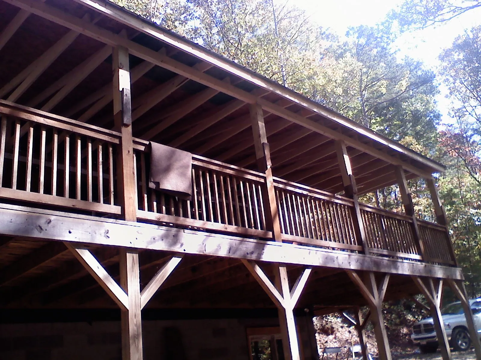 Timber framing under a new elevated porch and deck — Roof Leak Repair in Matthews by Roofing Brothers